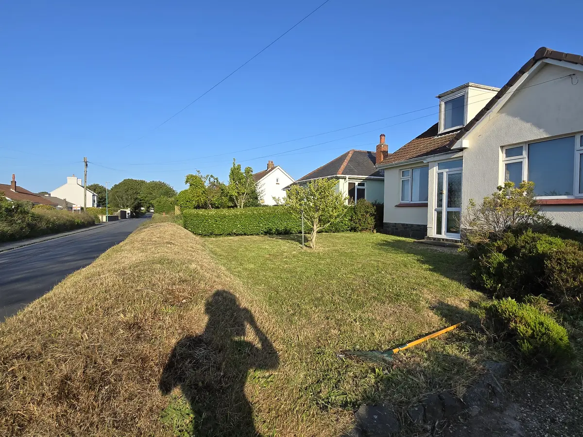 Garden border maintenance and soil preparation in Guernsey